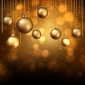 Christmas background with hanging gold baubles