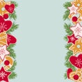 Christmas background with homemade cookies, holiday stuffed toys and fir branches