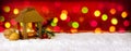 Christmas background with lantern and colorful lights.