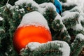 Christmas background with a large orange ball on the Christmas tree Royalty Free Stock Photo