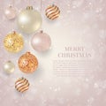 Christmas background with light Christmas baubles. Elegant Christmas background with gold and white evening balls Royalty Free Stock Photo