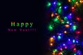 Christmas background with lights and free text space. Christmas lights border. Glowing colorful Christmas lights on black Royalty Free Stock Photo