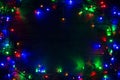 Christmas background with lights and free text space. lights. Glowing colorful Christmas lights . Royalty Free Stock Photo