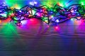 Christmas background with lights and free text space. Christmas lights. Glowing colorful Christmas lights . New Year. Royalty Free Stock Photo