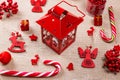 Christmas background made of red toys, candy, gifts, lantern and New Year decorations on burlap. Flat lay, top view, copy space. M Royalty Free Stock Photo