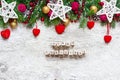 Christmas background with merry christmas inscription on wooden