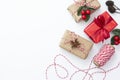 Christmas background, mock up with gift boxes wraped in craft paper, on white background. Winter holidays. Top view with copy Royalty Free Stock Photo