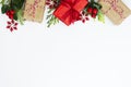 Christmas background, mock up with gift boxes wraped in craft paper, on white background. Winter holidays. Top view with copy Royalty Free Stock Photo