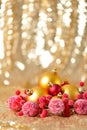 Christmas background, new year close up red and gold decoration balls on glitter abstract blurred holiday bokeh background Royalty Free Stock Photo