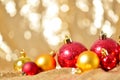 Christmas background, new year close up red and gold decoration balls on glitter abstract blurred holiday bokeh background Royalty Free Stock Photo