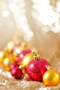 Christmas background, new year close up red and gold decoration balls on glitter abstract blurred holiday bokeh background Royalty Free Stock Photo