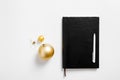 Christmas background with notebook, copy space. Template new year goal resolution Flat lay, top Royalty Free Stock Photo