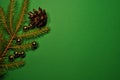 Christmas background. Pine branch, pine cone and golden balls. Royalty Free Stock Photo