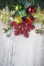 Christmas background with present bosex and balls on wooden texture Royalty Free Stock Photo