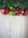 Christmas background with present bosex and balls on wooden texture Royalty Free Stock Photo