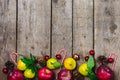 Christmas Background Background with Red Apples Citrus Cones Candy Canes and Red Christmass Balls on Old Wooden Backgroun Holidays