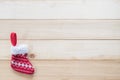 Christmas background with red baby sock xmas gift decoration on white pine wood table for boxing day, winter seasonal holiday Royalty Free Stock Photo