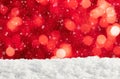 Christmas background with red lights, snowdrift and falling snow Royalty Free Stock Photo