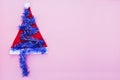 Christmas background with red hat, ribbon tree decorati