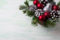 Christmas background with red ornaments, silver and snowy pine c Royalty Free Stock Photo