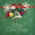 Christmas background with red silk traditional ribbon, white deer, evergreen tree and jingle bells. Royalty Free Stock Photo