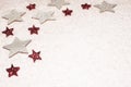 Christmas background, with red and silver glitter stars and snow