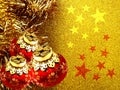 Christmas background with red and yellow ornament on a golden glitter background. Royalty Free Stock Photo
