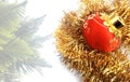 Christmas background with red and yellow ornament on a white textured background. Royalty Free Stock Photo