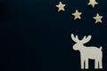 Christmas background.Reindeer and stars navy background. Royalty Free Stock Photo