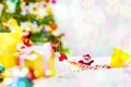Christmas background Santa Claus in red suit with white snowy scenes and Christmas tree on abstract bokeh glitter background Royalty Free Stock Photo