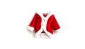 Christmas background Santa Claus Saint Nicholas red mini coat suit costume white cuffs flat lay isolated middle white background Royalty Free Stock Photo