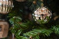 Christmas background - silver ball on the branch of spruce tree Royalty Free Stock Photo