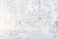 Christmas background with snowflake and shiny snow. New Year background with space for text.