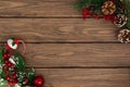 Christmas background with fir tree and decoration on wooden board. Royalty Free Stock Photo