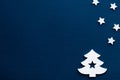 Christmas background.Stars and christmas tree on navy blue background. Royalty Free Stock Photo