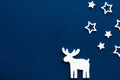 Christmas background.Stars and reindeer on navy blue background. Royalty Free Stock Photo