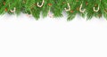 Christmas background with a Christmas tree, candies and snow berries. White background. Falling snowflakes. Template for your proj