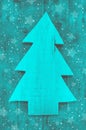 Christmas Background In Turquoise Green Color Of A Handmade Carved Tree.