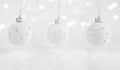 Christmas background. White Christmas decorations hang over the snow with bokeh lights. Christmas and New Years concept. Copy Royalty Free Stock Photo