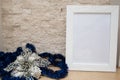 Christmas background. White frame mock up, silver flower and blu Royalty Free Stock Photo