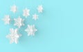 Christmas background with white paper snowflakes. Winter decoration. Xmas and new year paper art style greeting card, 3d render Royalty Free Stock Photo