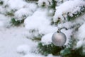 Christmas background with white snow and silver ball . Royalty Free Stock Photo