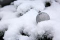 Christmas background with white snow and silver ball . Royalty Free Stock Photo