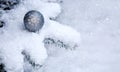 Christmas background with white snow and silver ball . Royalty Free Stock Photo