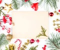 Christmas background with Xmas decorations and vintage paper card. Xmas flat lay top view Royalty Free Stock Photo