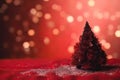 Christmas background with xmas tree and sparkle bokeh lights on red canvas background. Merry christmas card. Winter holiday theme Royalty Free Stock Photo