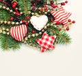 Christmas Background with Xmas Tree Twig and Red and Gold Decor Royalty Free Stock Photo