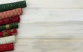 CHRISTMAS BACKGROUNDS. PATCHWORK CLOTH BORDER AGAINST WHITE WOO