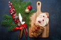Christmas Baked Ham Sliced With Red Berries And Festive Decorations