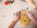 Christmas Bakery: Little girl cutting out dough for christmas cookies Royalty Free Stock Photo